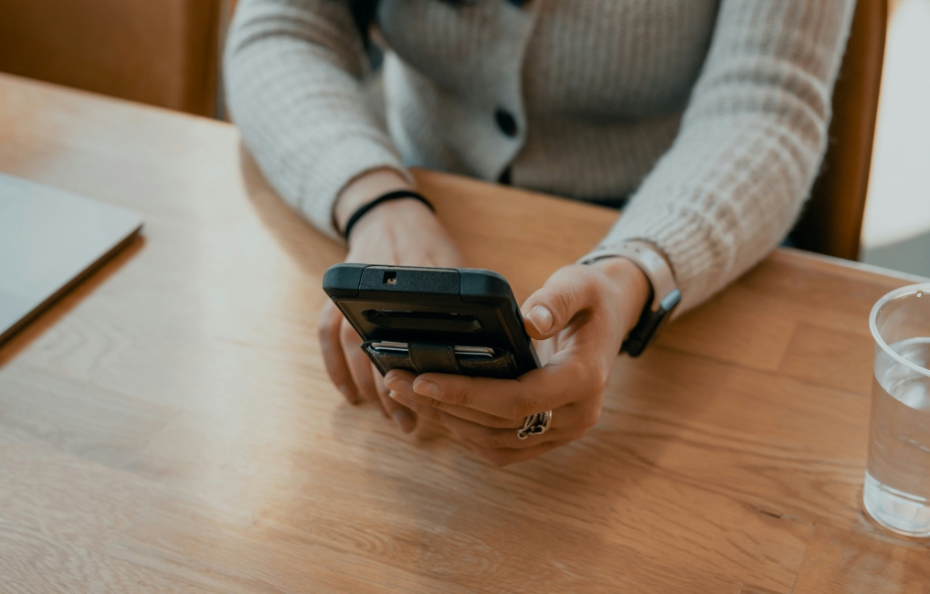 Woman holding a mobile phone