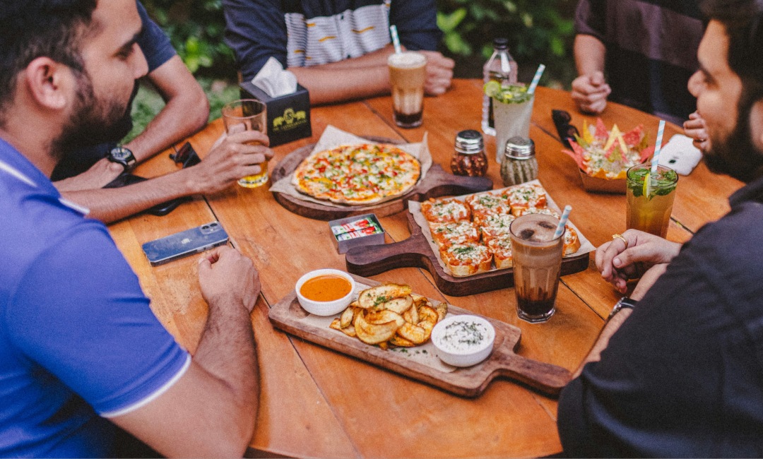 Friends at a table eating dinner
