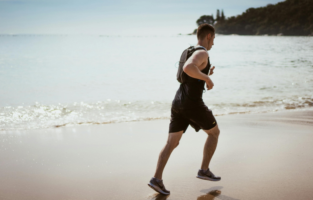 Man running on a beach